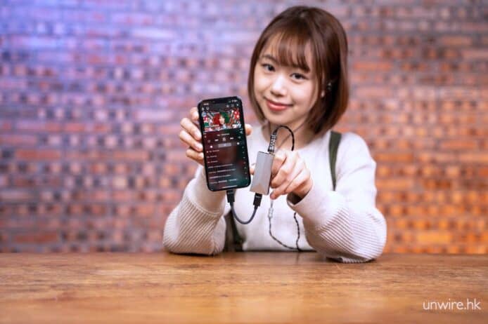 a girl holding Astell&Kern AK HC4